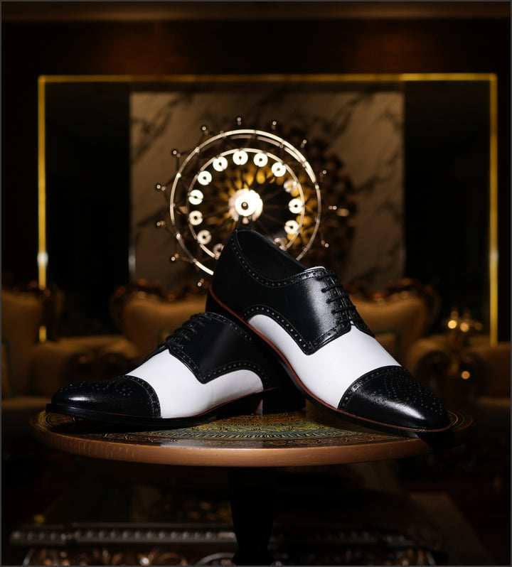 Cueřo black and white two-tone leather brogue dress shoes showcasing balanced structure, hand-finished detail, and traditional craftsmanship