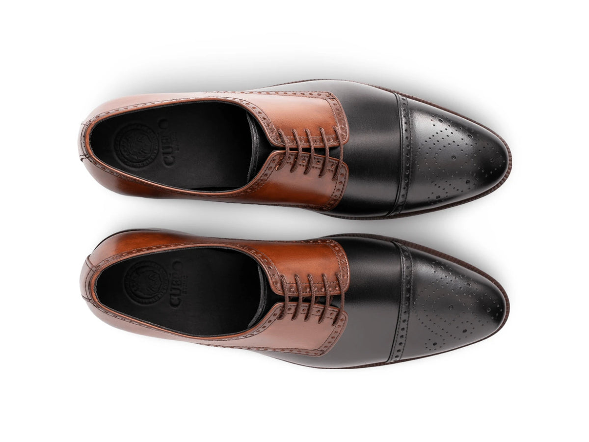 The Kensington Two-Tone men’s cognac and black cap-toe oxford dress shoes top view