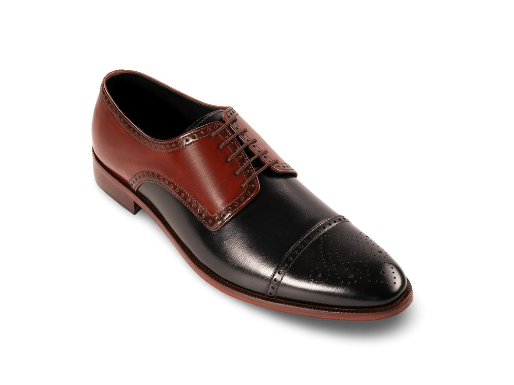 The Oxblood Regent men’s oxblood and black two-tone cap-toe oxford dress shoe three-quarter view