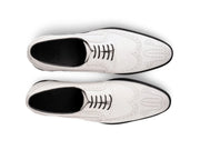 The White Sovereign men’s white wingtip brogue dress shoes top view